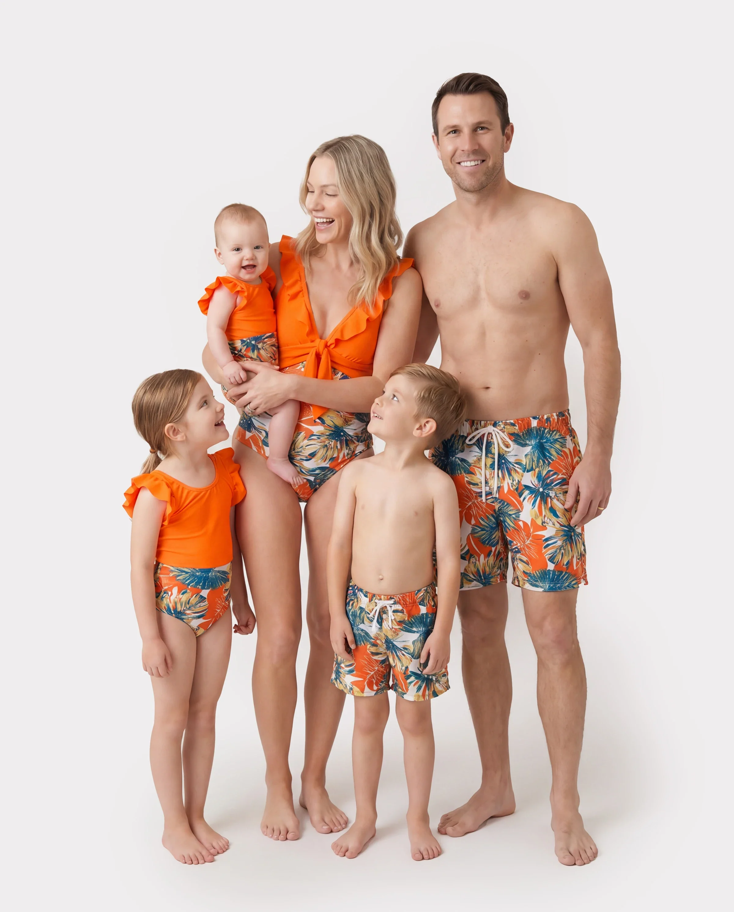 Family Matching Orange and All Over Tropical Plant Print Splicing Ruffle One-Piece Swimsuit and Swim Trunks Shorts Orange color