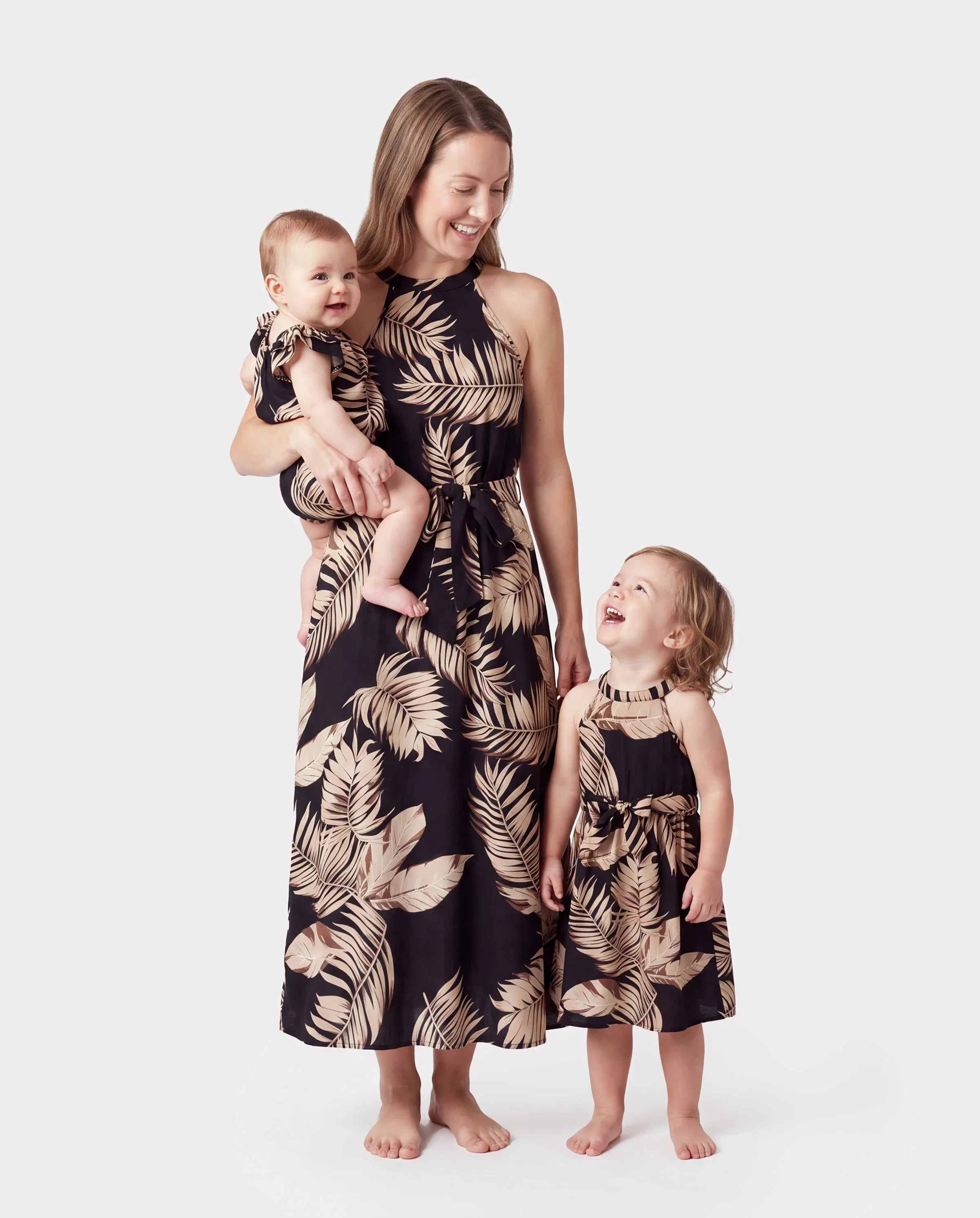 Mommy and Me Family Matching Solid Leaf Sleeveless Halter Dresses And Short Sleeve Tops Sets Black